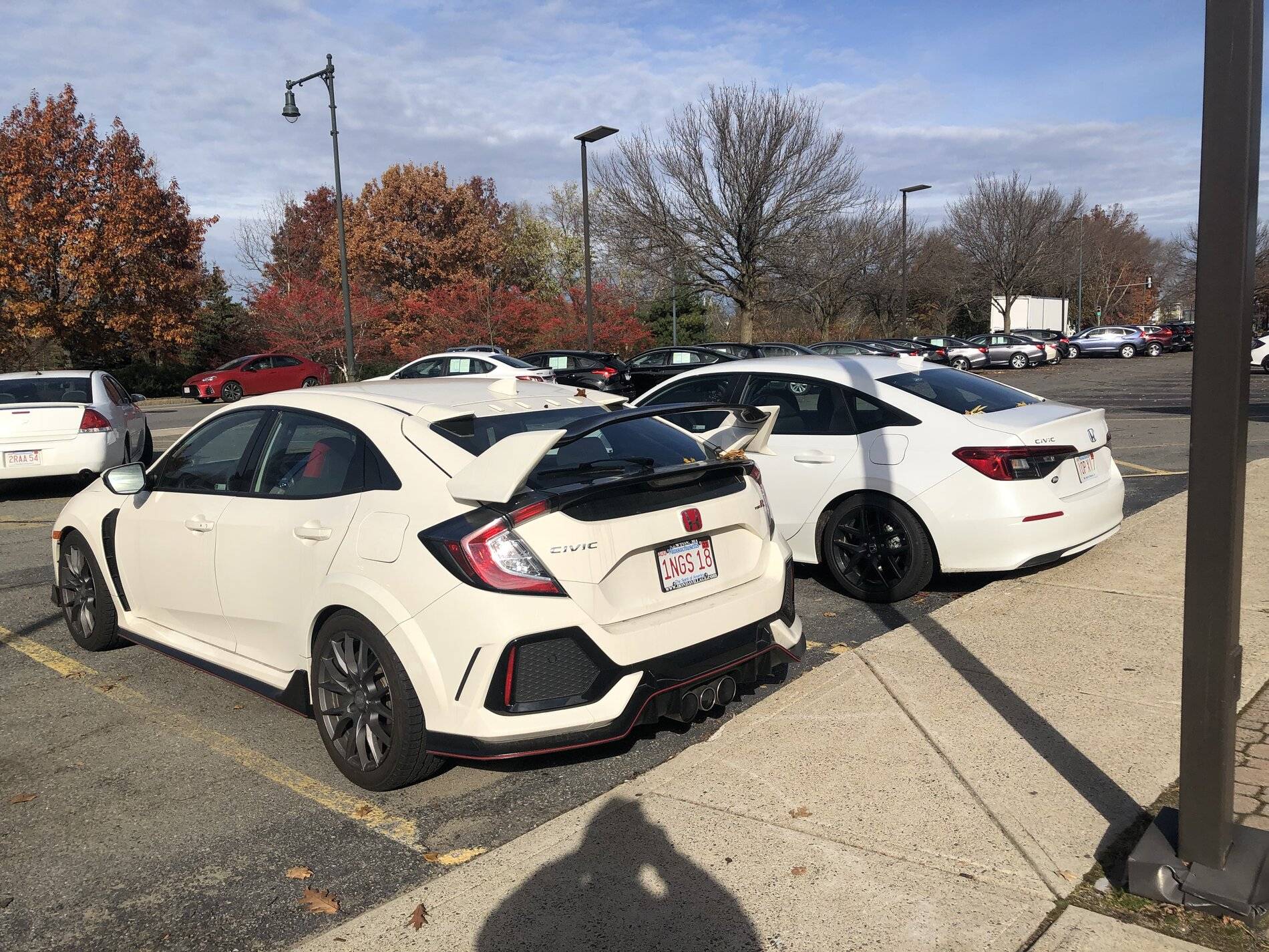 11th Gen Honda Civic Pics: Gen XI Civic sedan next to Gen X Civic Type R B026C3FF-CB3A-4F8E-8908-113937B38174