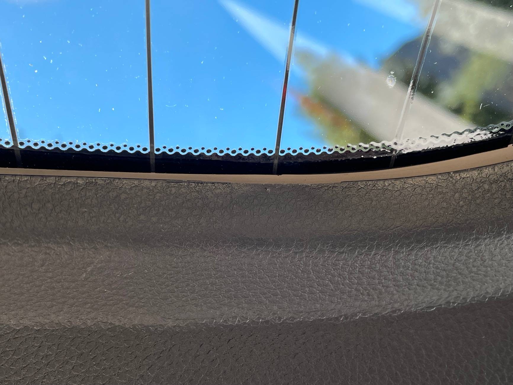 11th Gen Honda Civic Did my tint installer melt the hatch trim or do they all look like this? IMG_3104