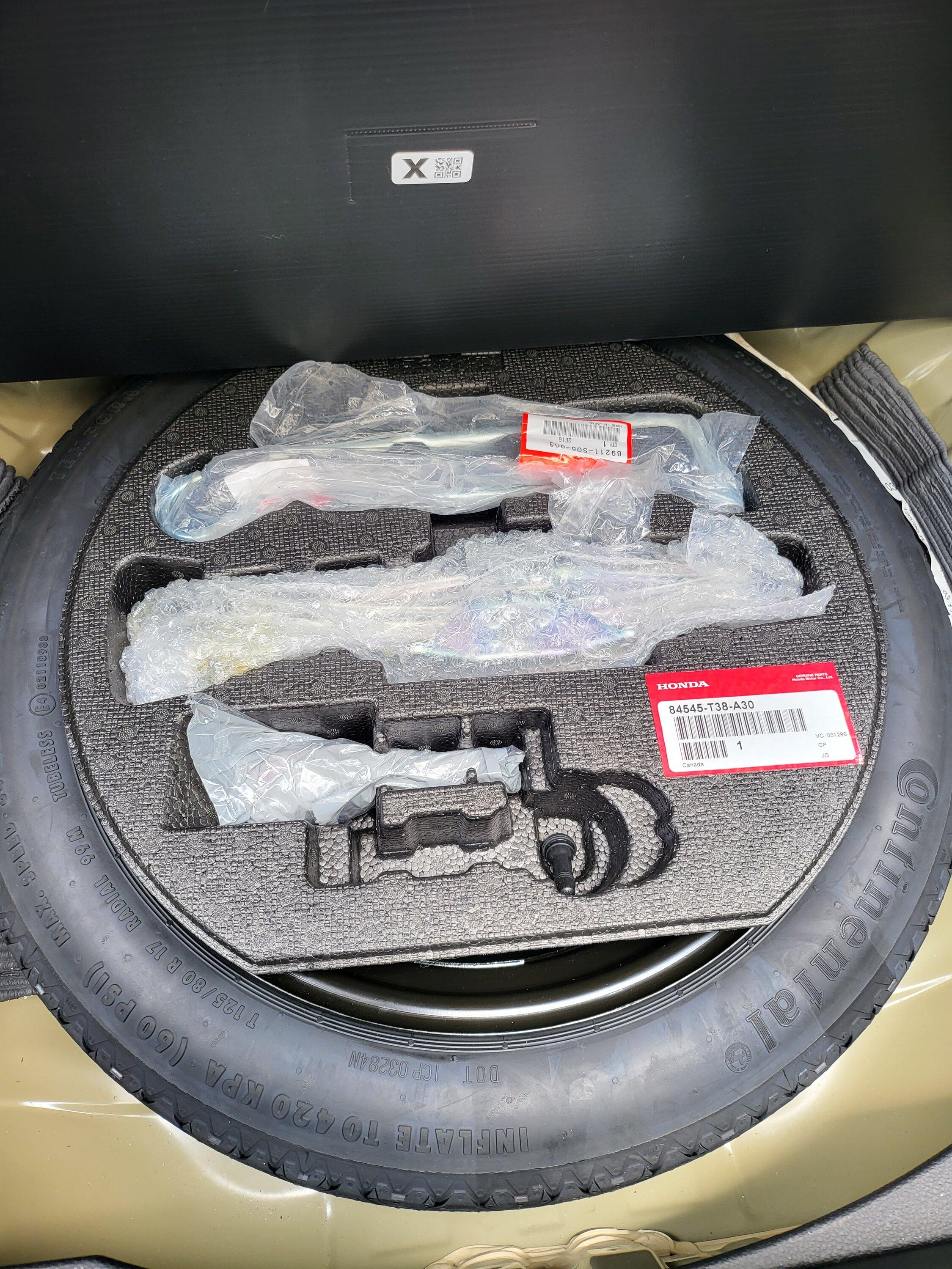 11th Gen Honda Civic Tools in trunk. What goes here? spare tire si