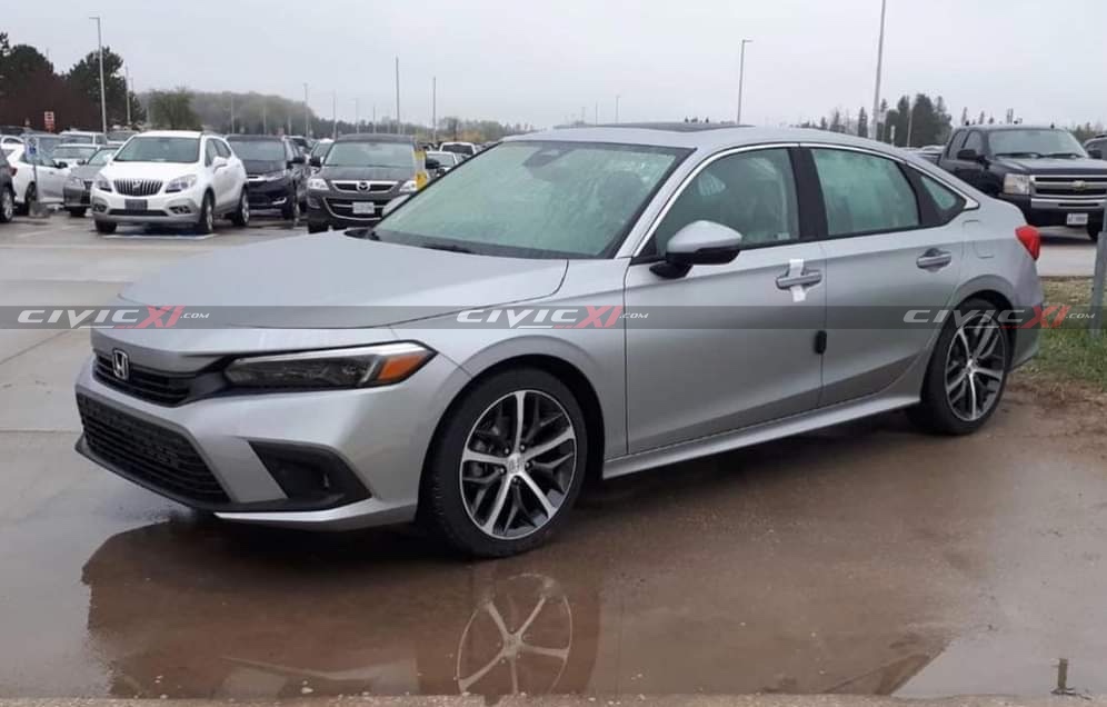 2022 Silver Civic Touring posing outside production plant | CivicXI